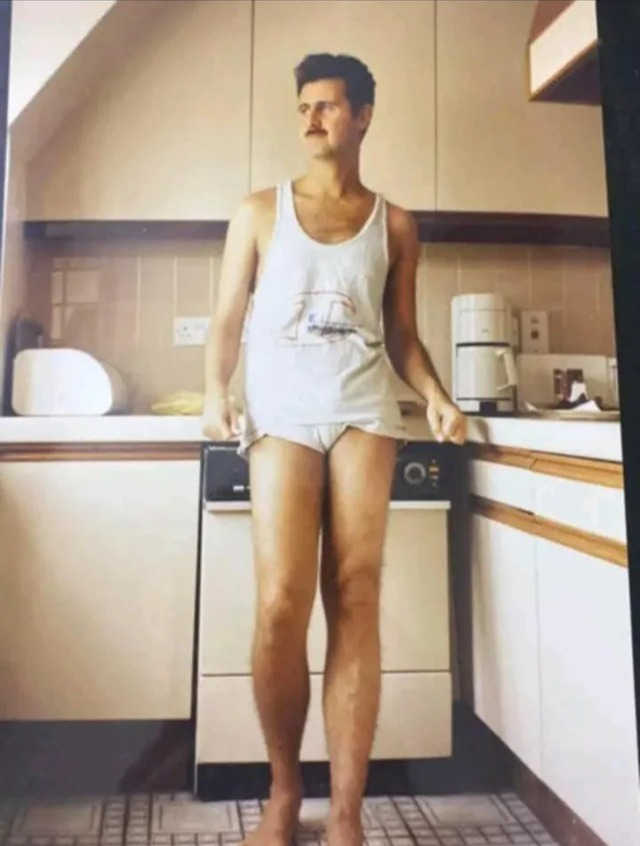 Photo of a young Bashar al-Assad in his kitchen.