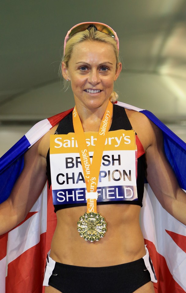 Jenny Meadows, British 800m champion, holding her gold medal.