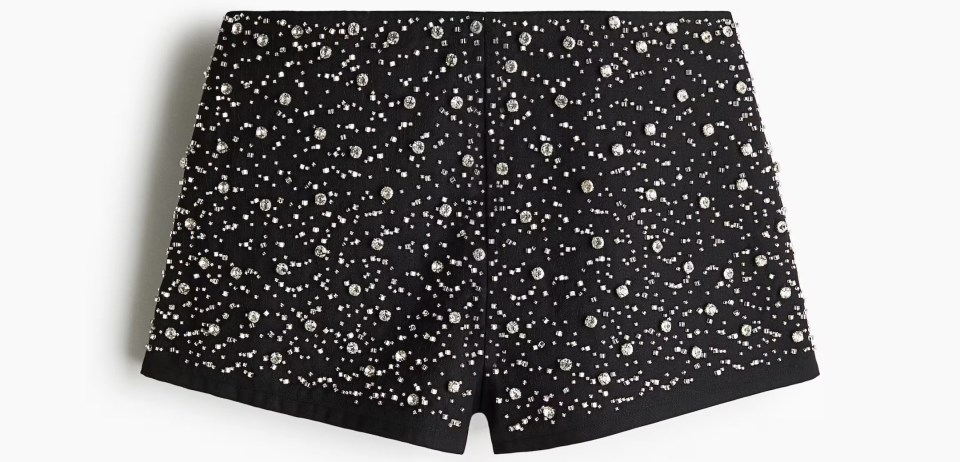 Black shorts embellished with rhinestones.