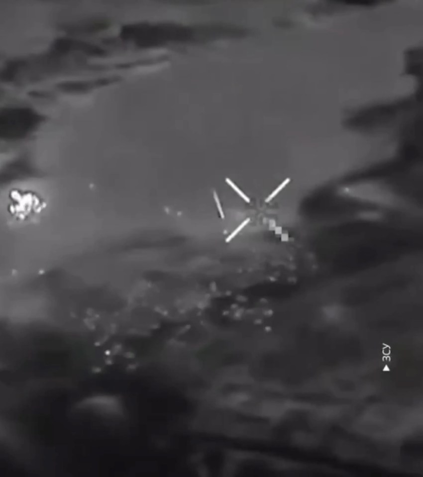 Night vision footage of two HIMARS missiles striking a target.