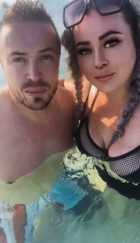 Raya Davis and Tim Jones in a pool.