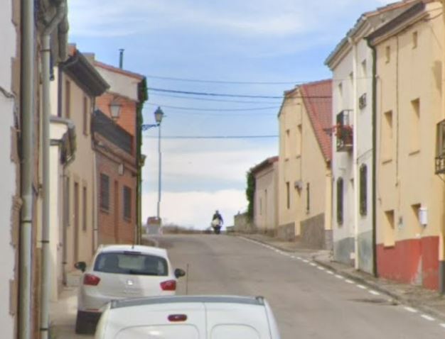 A Google Street View picture possibly shows someone transporting a dead body in a wheelbarrow down a street in Spain