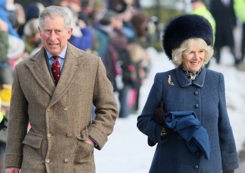 The Royals enjoy following the tradition of pulling Christmas crackers and wearing hats - although Charles won't partake.