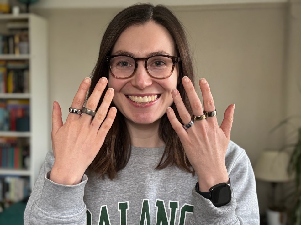 Alice Fuller wearing the five smart rings she tested