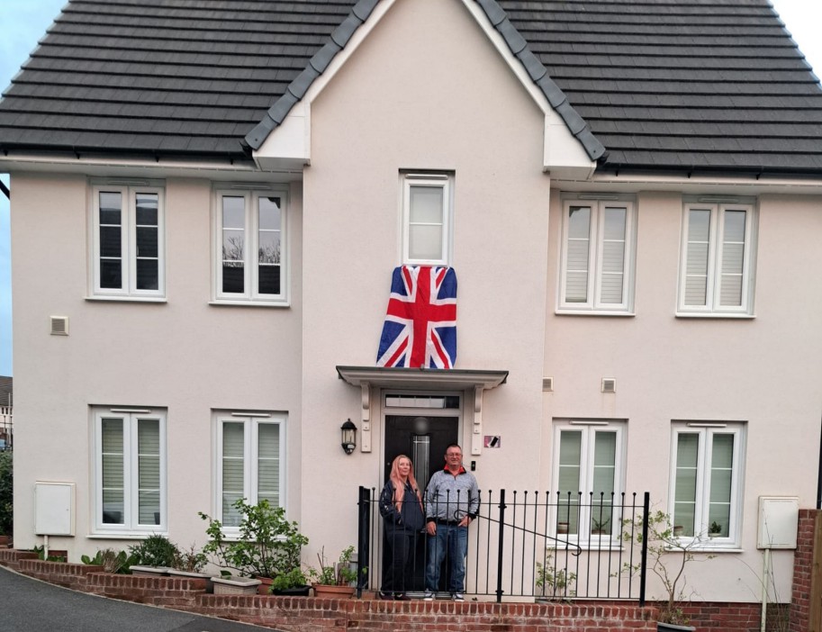 The couple outside what they thought was their dream detached home in Ivybridge, Devon