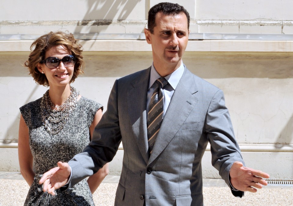 Bashar al-Assad and his wife Asma arrive at the Elysee palace in Paris in 2008