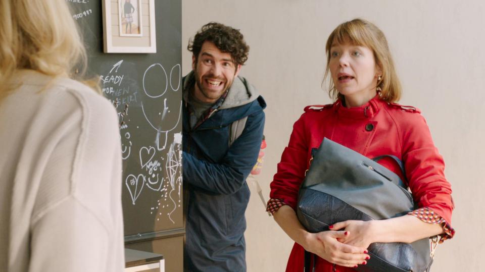 A scene from Motherland showing two women and a man.