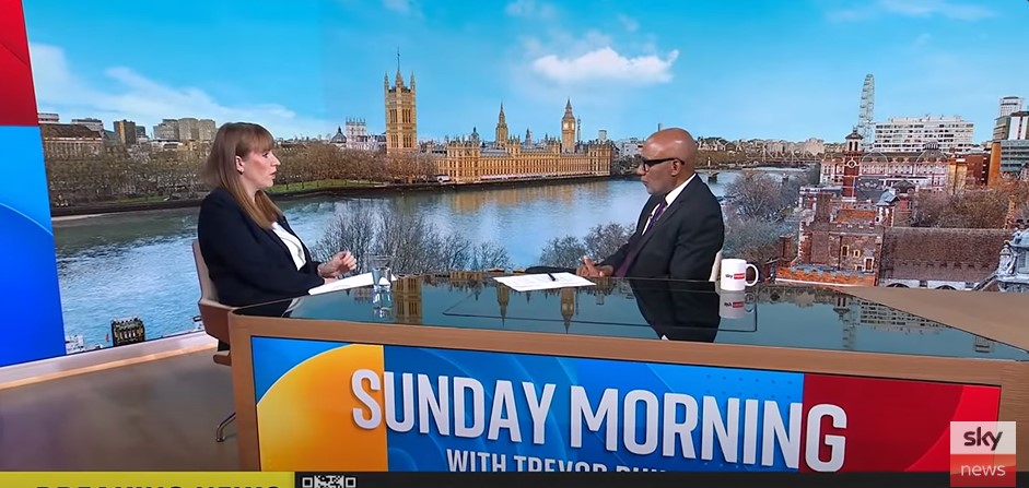 Angela Rayner, pictured with Sir Trevor Phillips, struggled to explain how Labour’s housing plans will cope with the 2.5 migrants expected to arrive in Britain