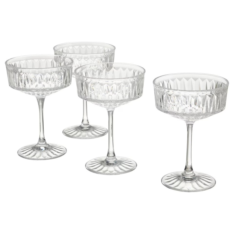 Four coupe glasses.