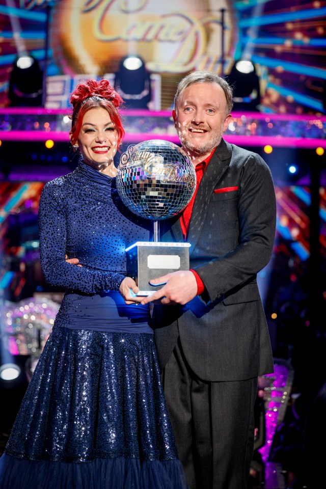 Winners holding the Strictly Come Dancing glitterball trophy.