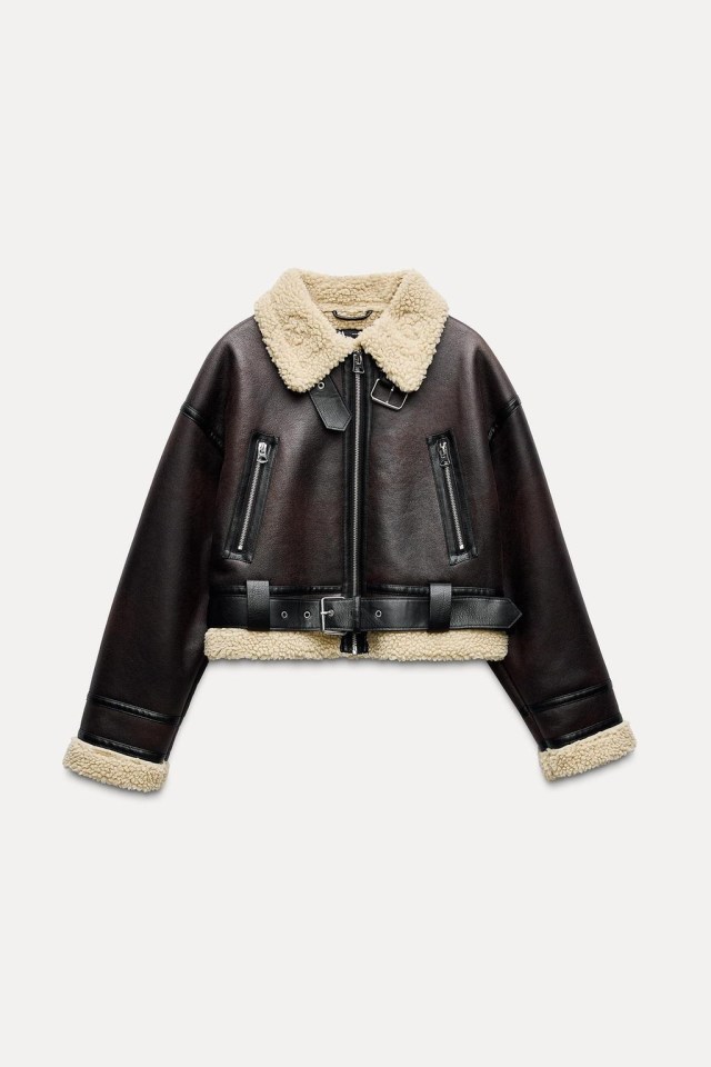 Brown cropped aviator jacket with cream sherpa collar and cuffs.