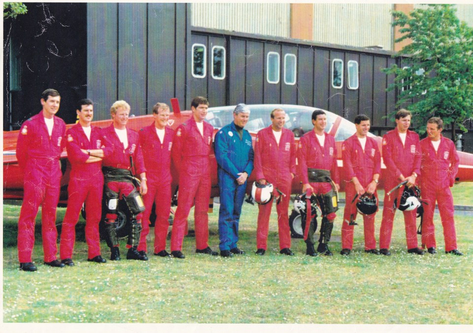 Fred - pictured in blue - is an honorary Red Arrow