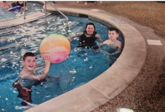 Harriet pictured enjoying happy times with her sons Louis and Tom