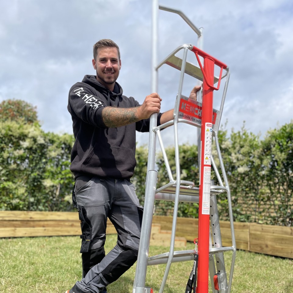 Man standing next to a ladder.