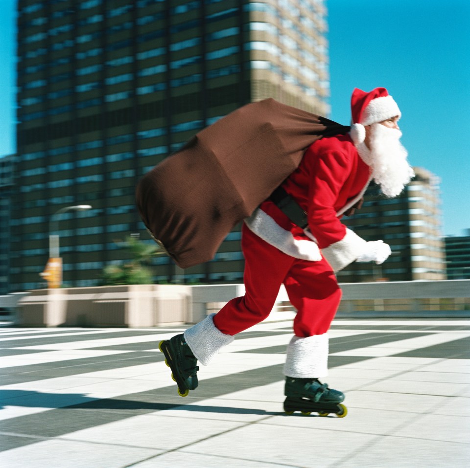 Residents of Caracas in Venezuela often dress as Santa and roller skate on Christmas morning (stock image)