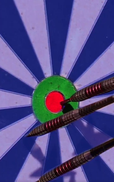 Three darts hitting near the bullseye of a dartboard.