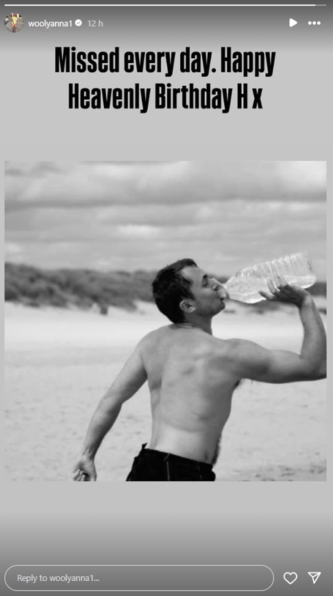 Black and white photo of a man drinking water on a beach; birthday tribute.