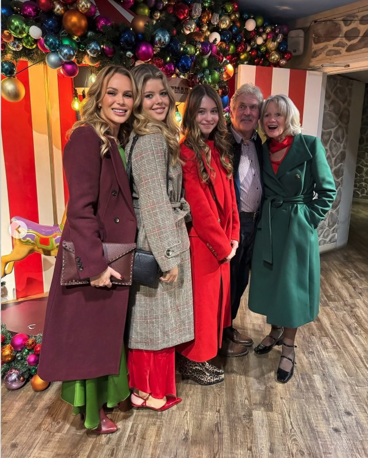 Amanda Holden with her family at a Christmas event.