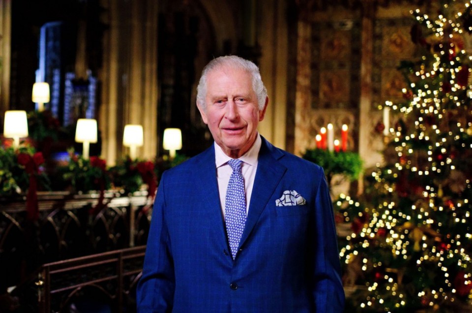 King Charles III in a blue suit during his Christmas broadcast.