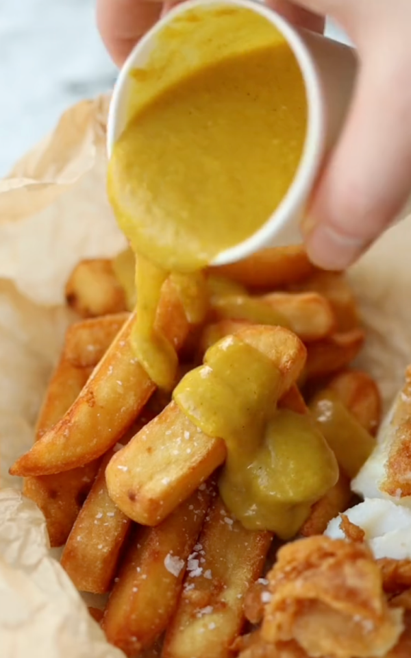 By 'chippy chips' he means thick-cut chips with curry sauce