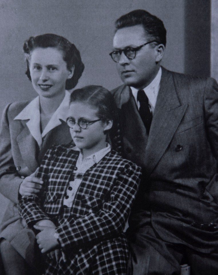 Agnes pictured with her parents in 1943