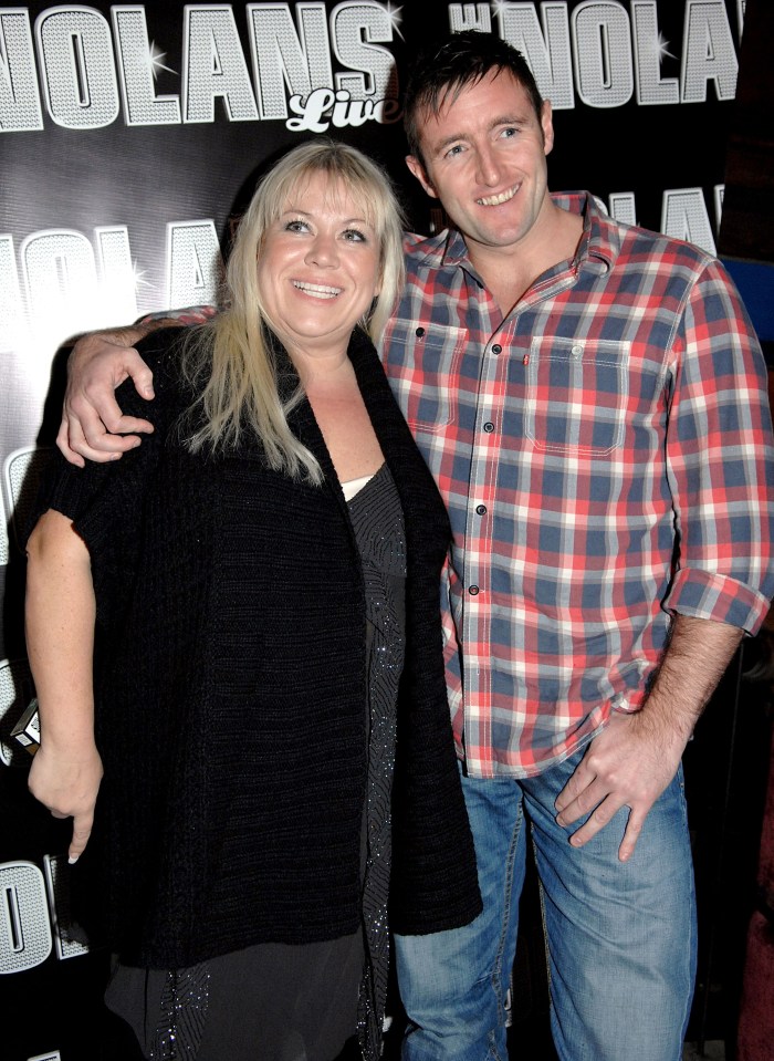 Actress Tina Malone and her partner Paul Chase at a party.