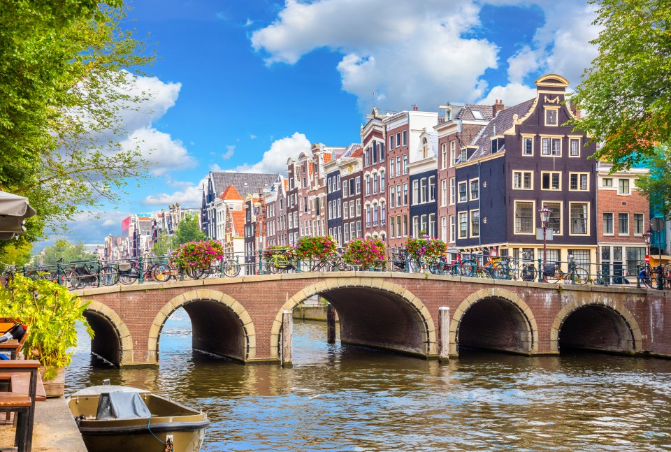 Amsterdam canal houses and bridge.