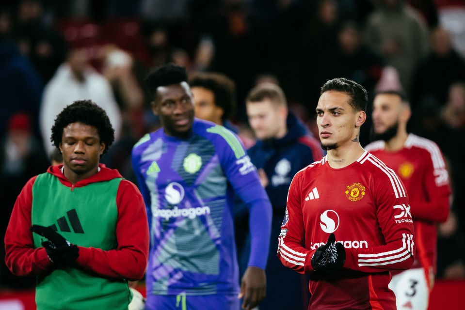 Antony of Manchester United applauds fans after a match.