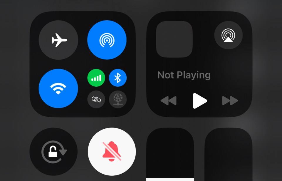 iPhone control center showing airplane mode, Wi-Fi, cellular, Bluetooth, personal hotspot, Do Not Disturb, and media controls.