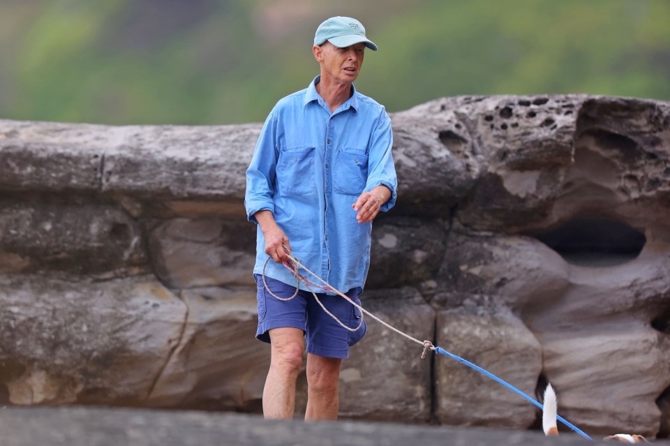 Greg was seen walking on the beach with his pup