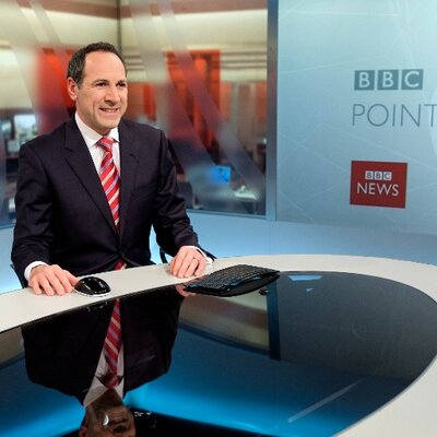 BBC presenter Will Glennon at his desk.