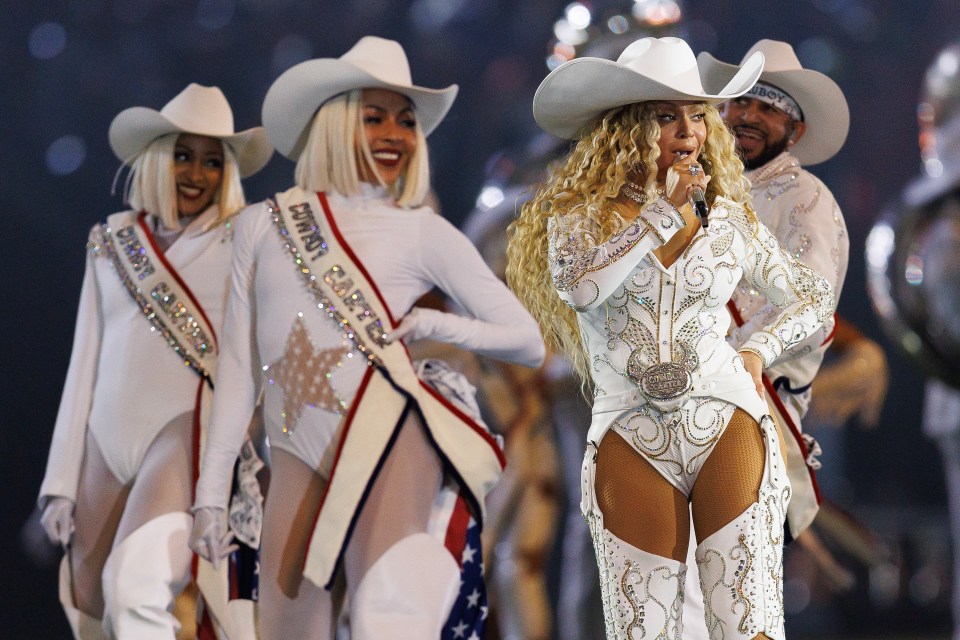 Beyoncé performing at an NFL halftime show.