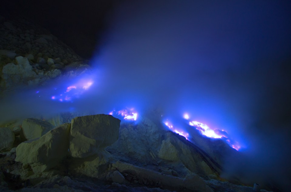 Blue sulphur flames at the volcano site