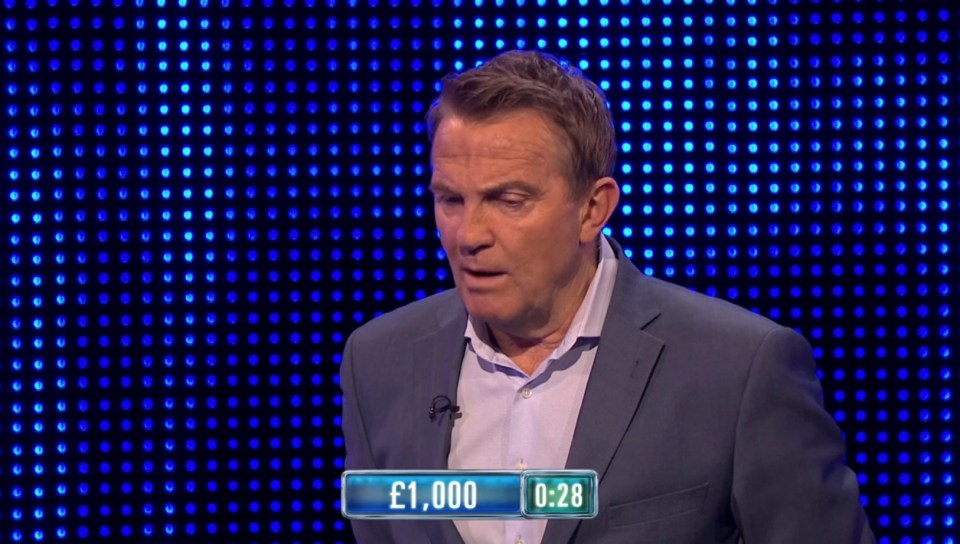 Bradley Walsh, host of The Chase, looks displeased.  £1,000 and 0:28 are displayed.