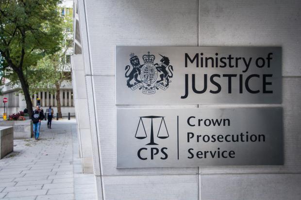 Ministry of Justice and Crown Prosecution Service signage.