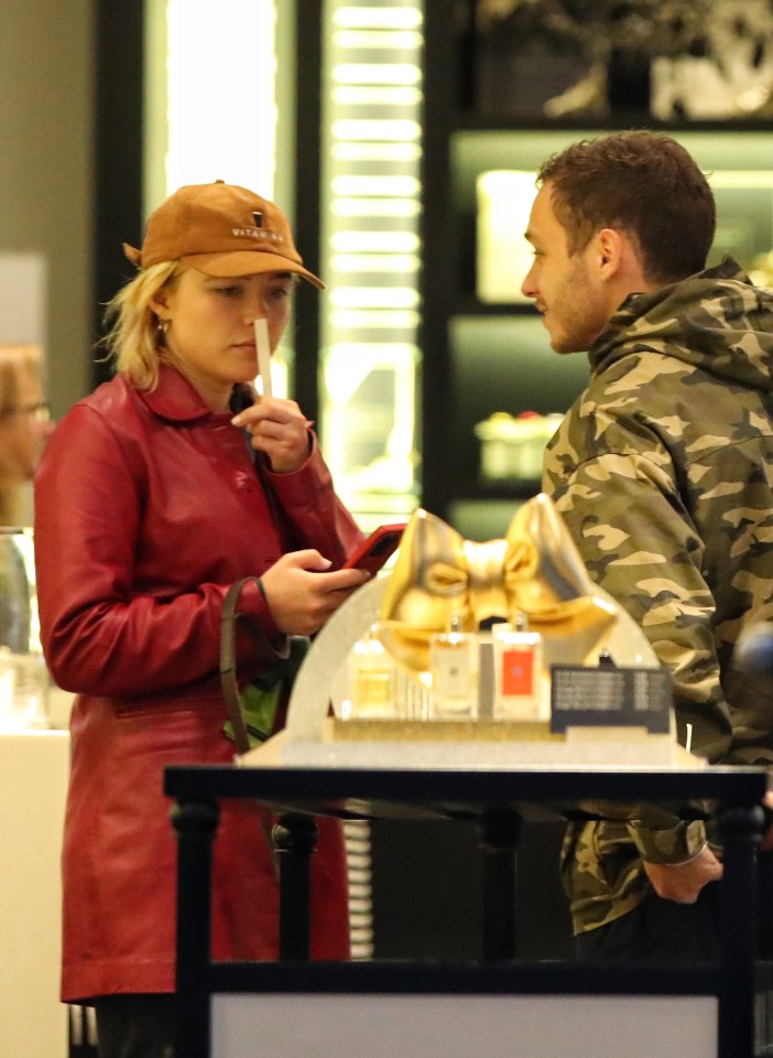 Dressed in a red leather jacket, Florence was out shopping with Finn