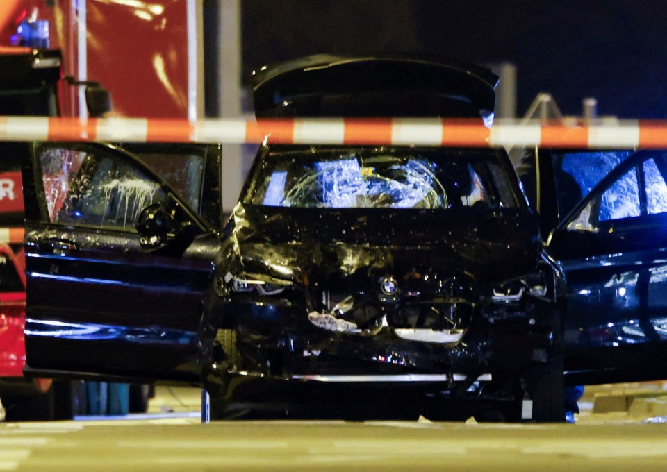 Damaged car at the scene of a Christmas market attack.