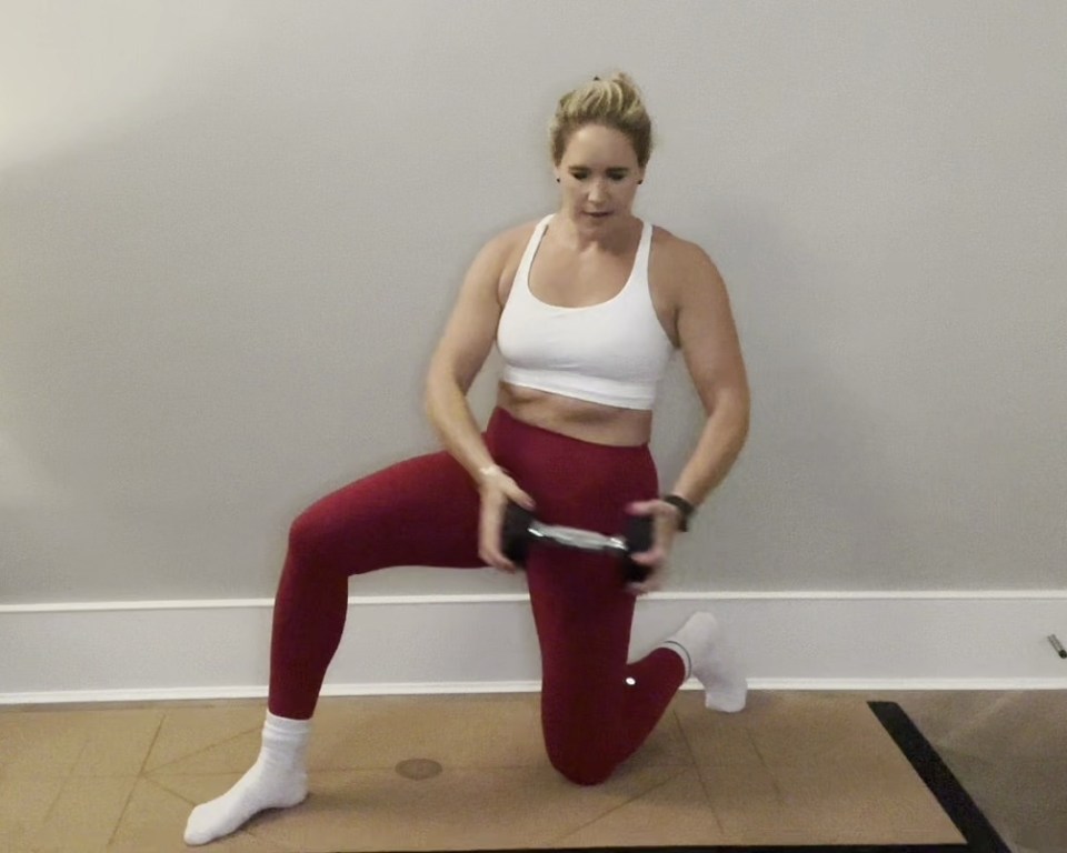 Woman demonstrating exercises to reduce love handles.