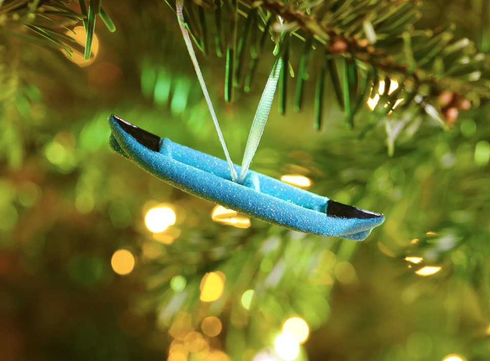 A blue boat could be the perfect gift for those who love being out on the water