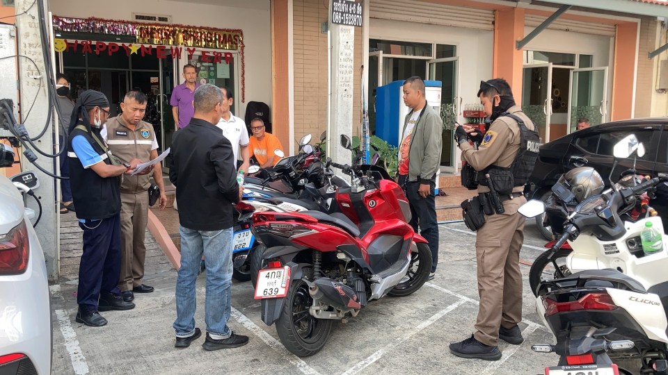 Local authorities seen in front of the hotel in Pattaya, Thailand