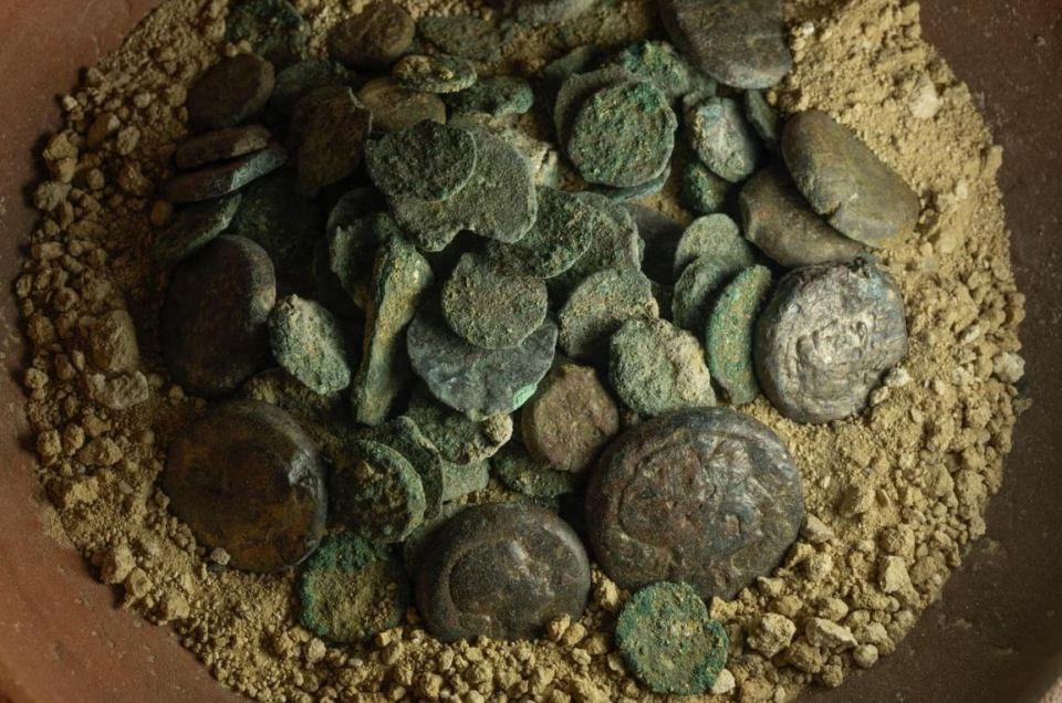 The dig unearthed about 350 coins, many showing an image of Cleopatra VII