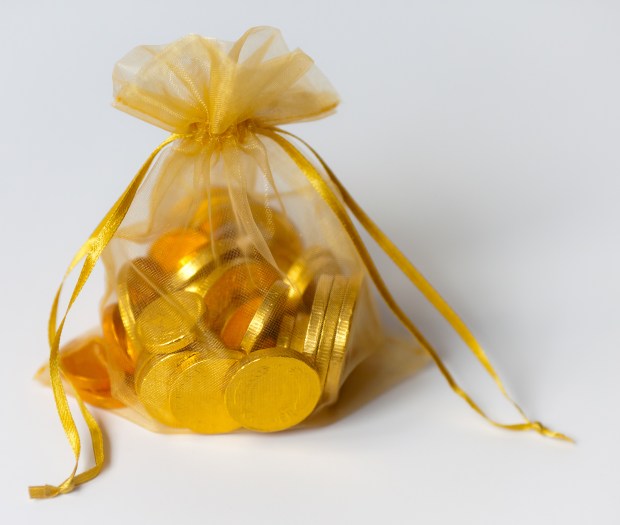 Gold chocolate coins in a gold organza bag.