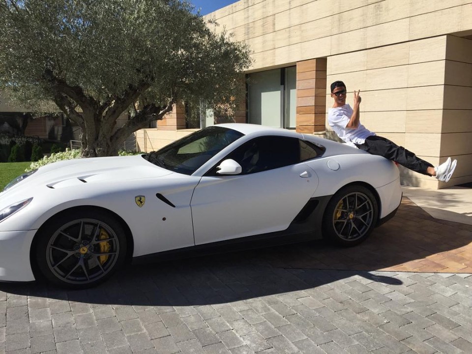 He looked particularly delighted when he got this white Ferrari