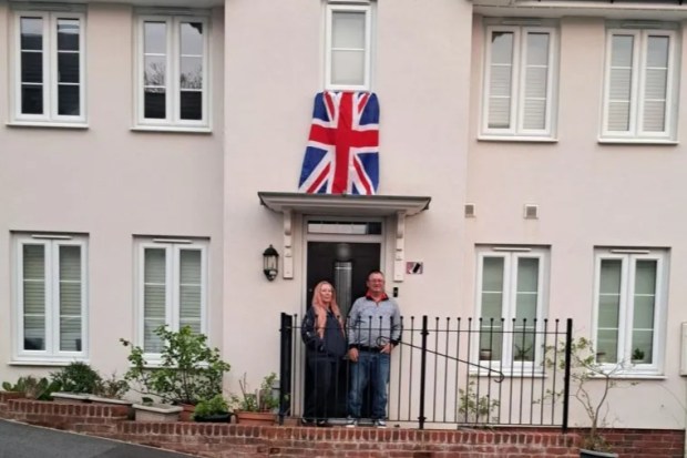 PIC FROM Kennedy News and Media (PICTURED: DAYLE DIXON, 53, AND PARTNER MARK LEE,49, OUTSIDE THEIR BOTCEHD NEWBUILD HOME ) The family who discovered their 'botched' dream newbuild was 'only worth £1' claim it's now ruining Christmas too - as loved ones refuse to visit. Dayle Dixon and Mark Lee say they noticed cracks in the floor at their dream detached home in Ivybridge, Devon, just days before getting the keys in 2018. Construction firm Barratt Homes reportedly told them the property was just drying out but since then they've faced eight years of damp, floor movement and dangerous dust. DISCLAIMER: While Kennedy News and Media uses its best endeavours to establish the copyright and authenticity of all pictures supplied, it accepts no liability for any damage, loss or legal action caused by the use of images supplied and the publication of images is solely at your discretion. SEE KENNEDY NEWS COPY - 0161 697 4266..