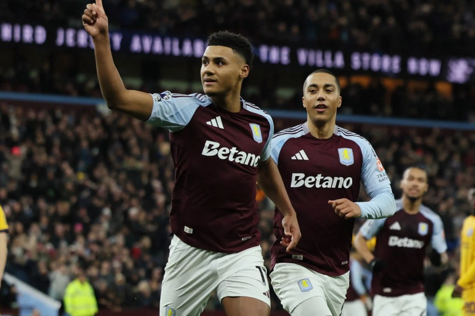 Aston Villa players celebrating a goal.