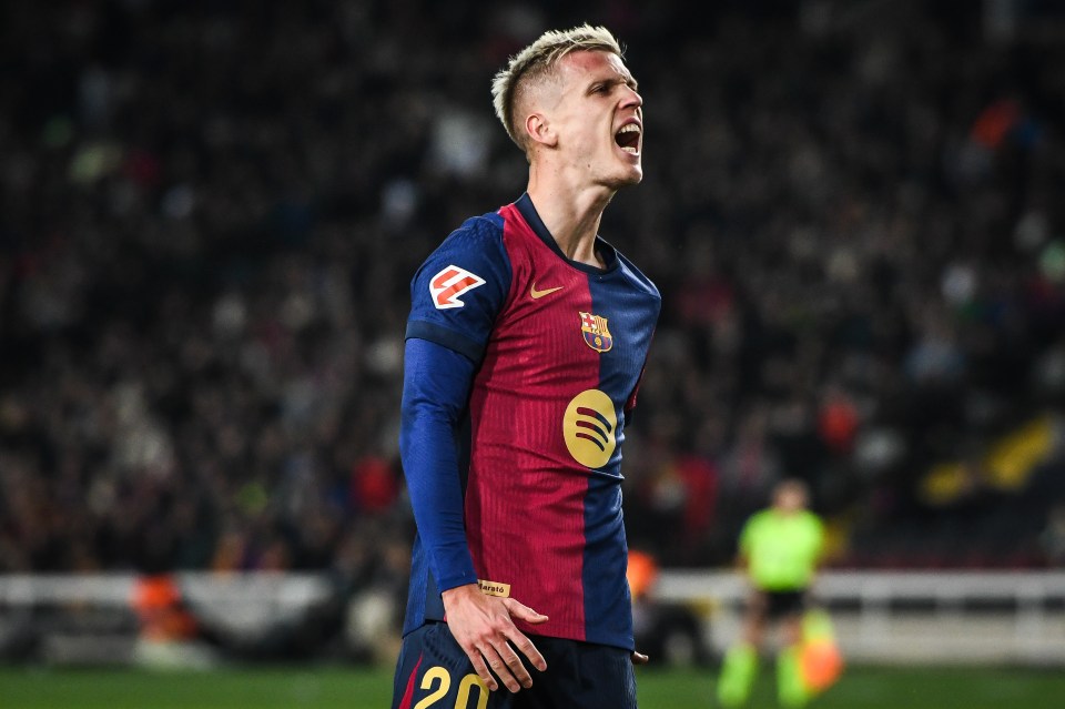 Dani Olmo of FC Barcelona looks dejected during a La Liga match.