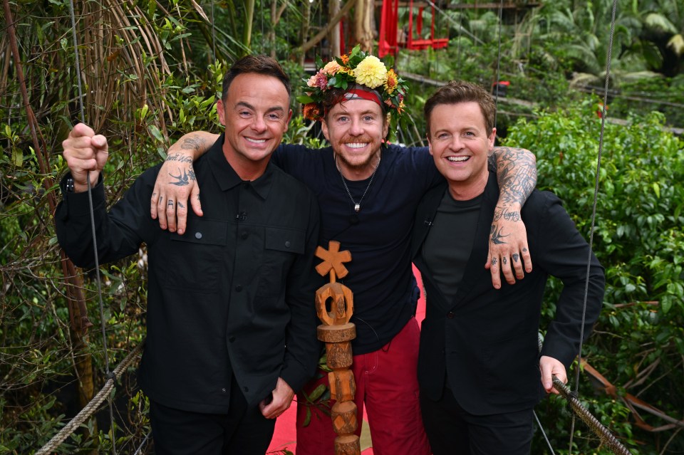 Ant and Dec pose with Danny on the show's famous bridge after his victory