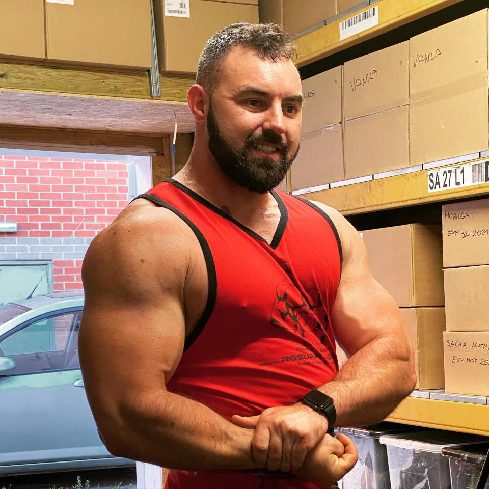 Karol Olender, bodybuilder, in his warehouse.