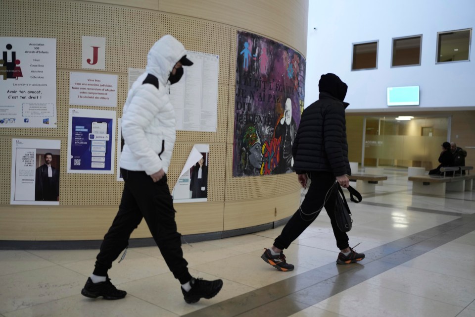 Defendants arrive at the courthouse earlier this month