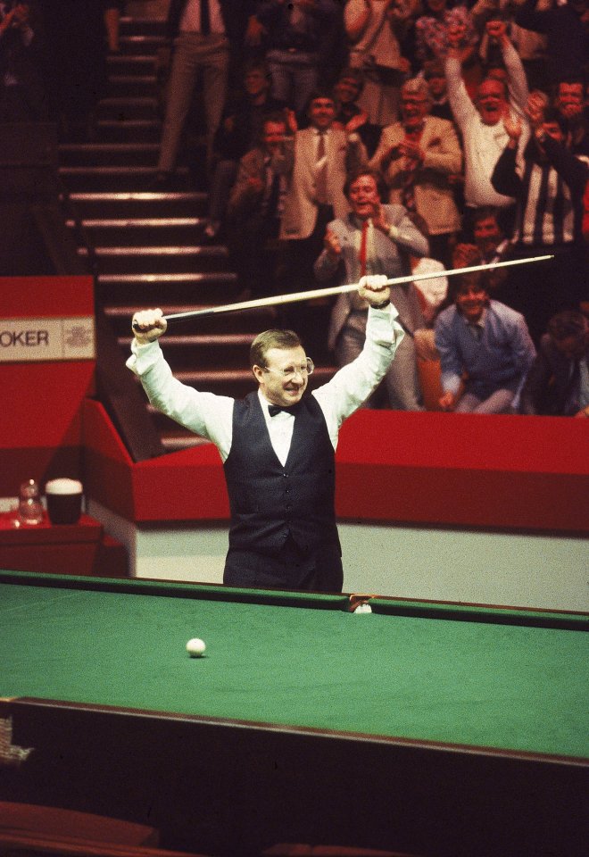 Taylor, known for his upside-down glasses, held his cue aloft after the stunning final in most of snooker's most iconic photos